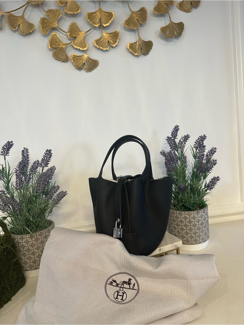 Elegant Structured Black Leather Tote with Padlock Accent